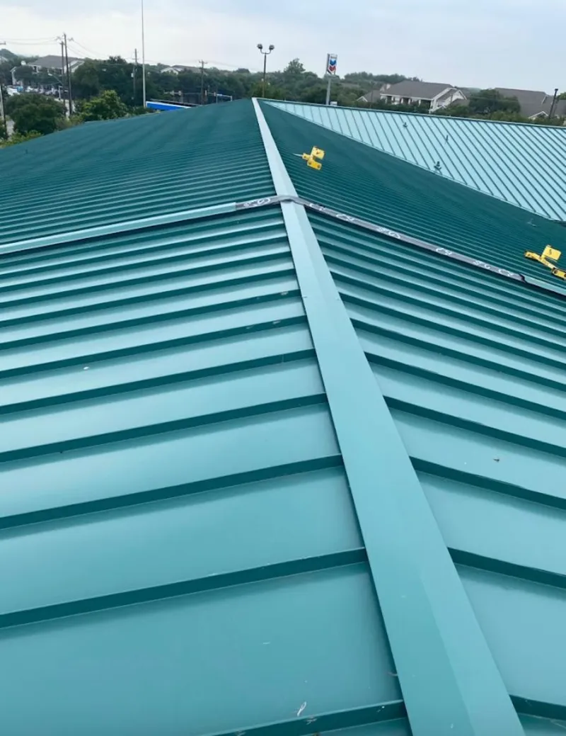 Green commercial metal roof ridge and valley for Metal Roof Repair in Bloomingdale